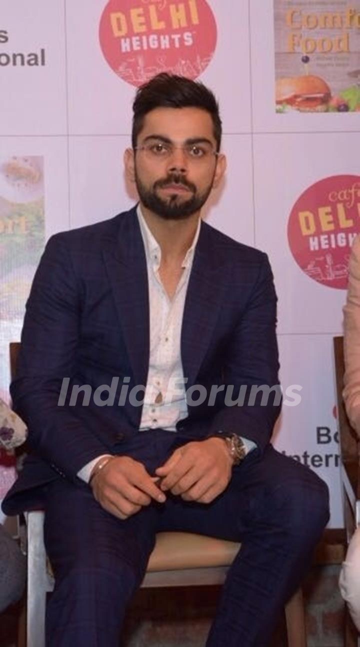 Virat Kohli in Mayyur Girotra for a Book Launch in Delhi