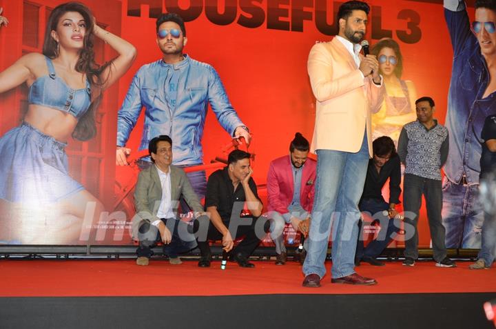 While Abhishek interacts with media, the rest sits down - at Housefull 3 Success Meet!