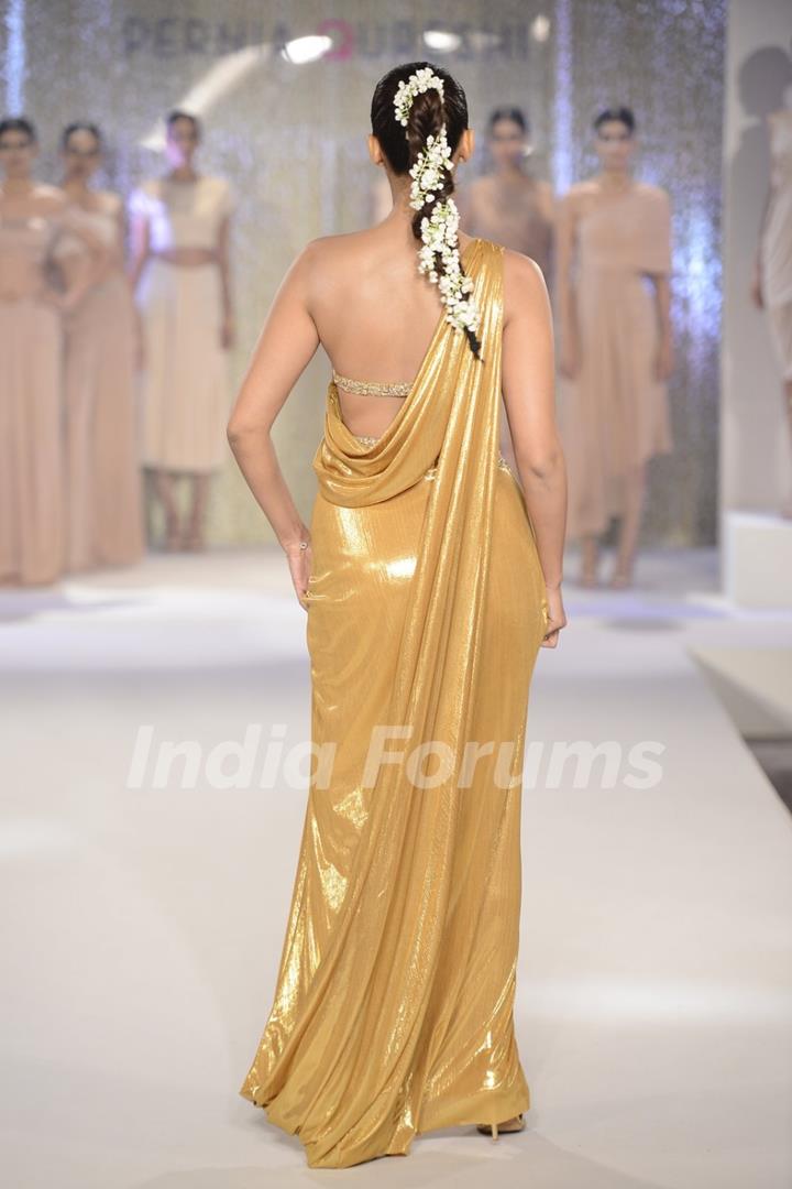 Sonam Kapoor in golden dress walks the ramp for Pernia Qureshi!