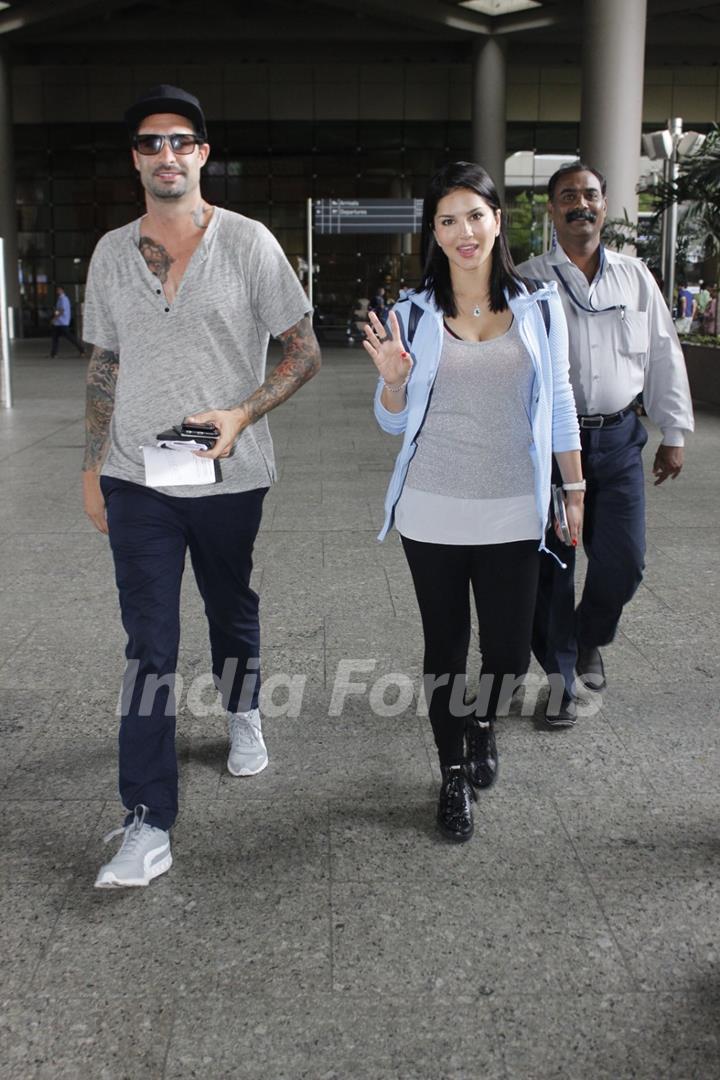 Sunny Leone with husband Daniel Weber at Airport