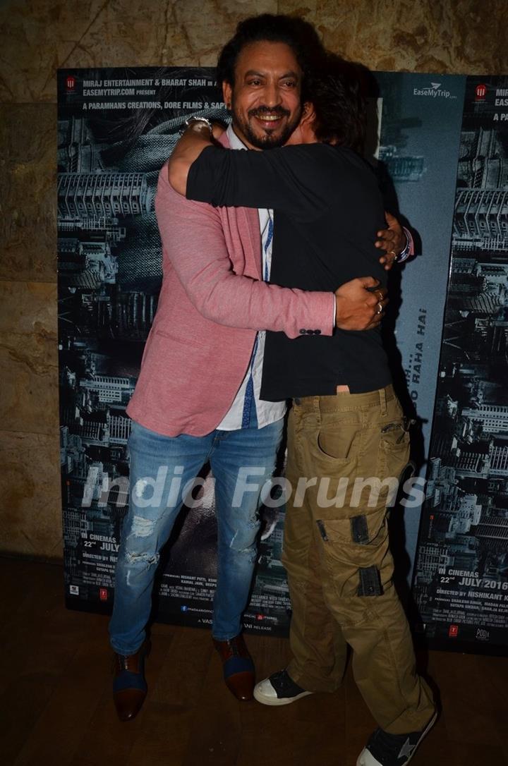 Irrfan Khan and Shah Rukh Khan hugs each other at the special screening of Madaari