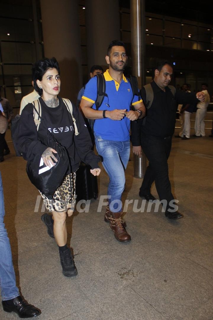 Mahendra Singh Dhoni snapped at airport