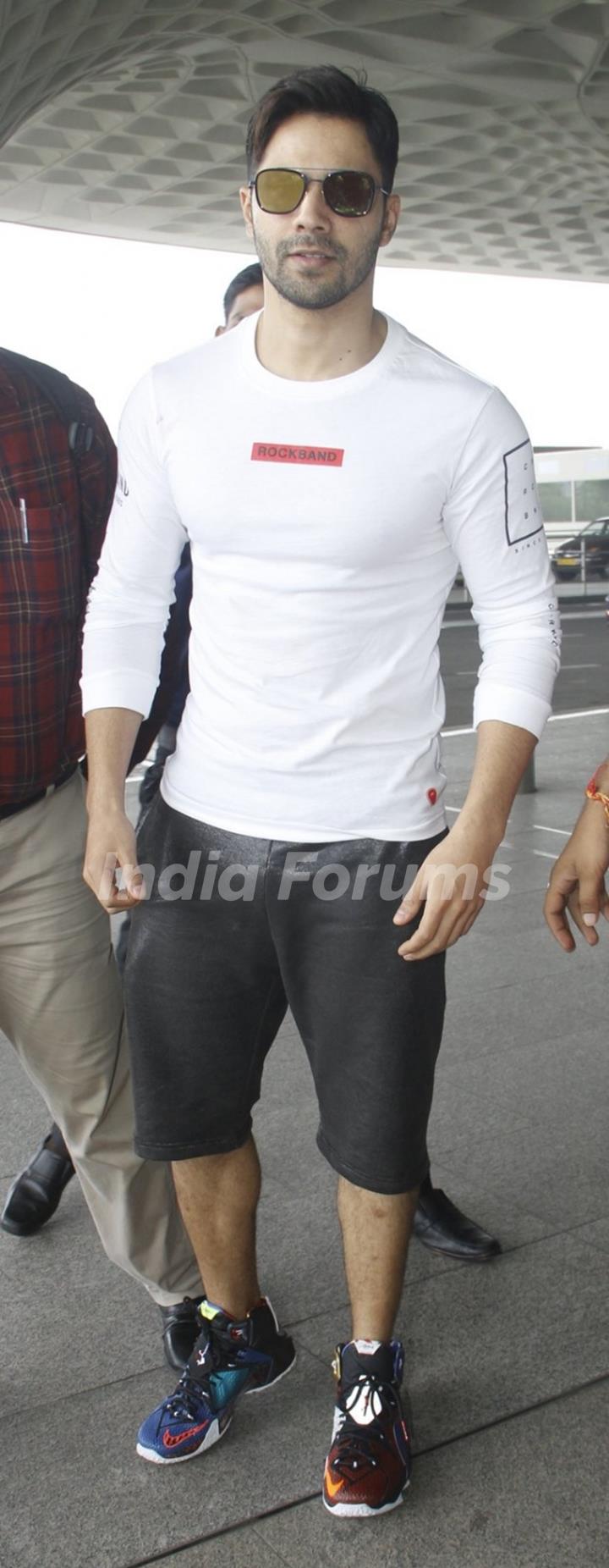 Varun Dhawan snapped wearing different shoes at Airport