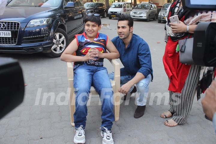 Varun Dhawan poses with a fan at Mehboob Studio