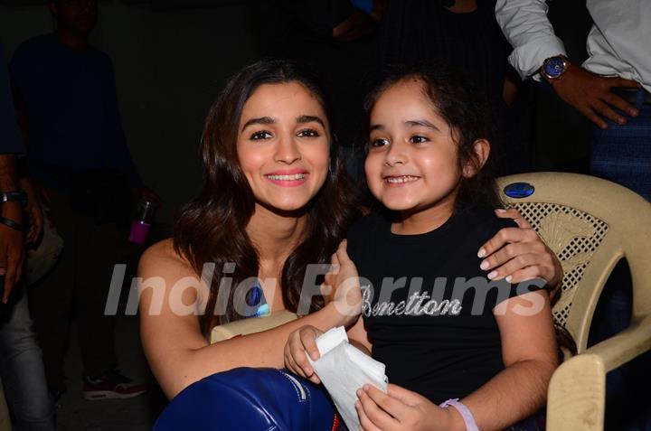 Alia Bhatt poses with a fan at Mehboob Studio