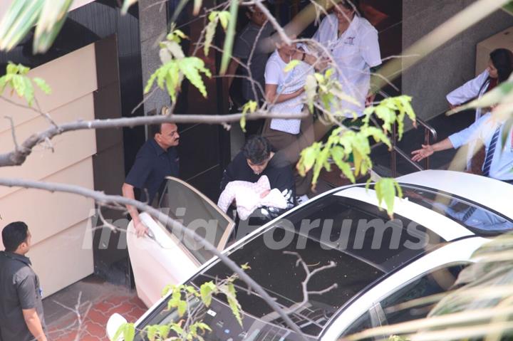 Karan Johar taking his babies home from hospital