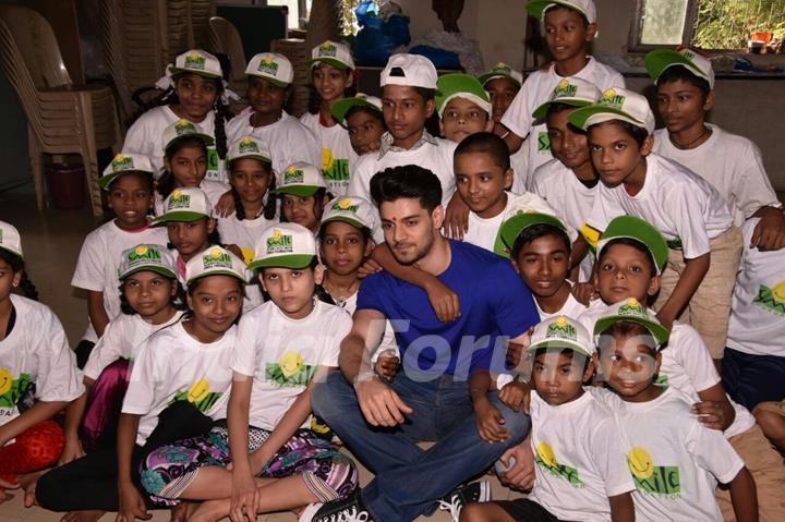 Sooraj with the kids of the foundation