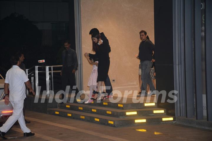 Aishwarya, Abhishek with Aaradhya outside an eatery