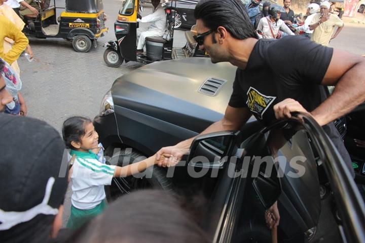 Singh greets a little fan!