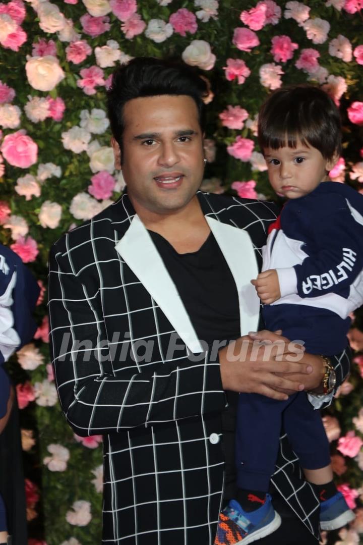 Krushna Abhishek with son at Kapil Sharma and Ginni Chatrath's Reception, Mumbai