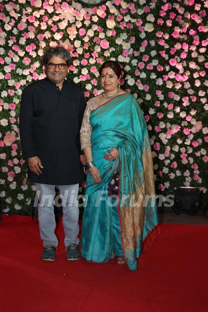 Vishal Bharadwaj with wife Rekha Bharadwaj at Kapil Sharma and Ginni Chatrath's Reception, Mumbai