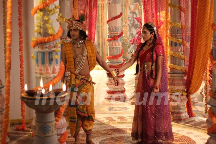 Radha holding hand of Krishna from RadhaKrishn