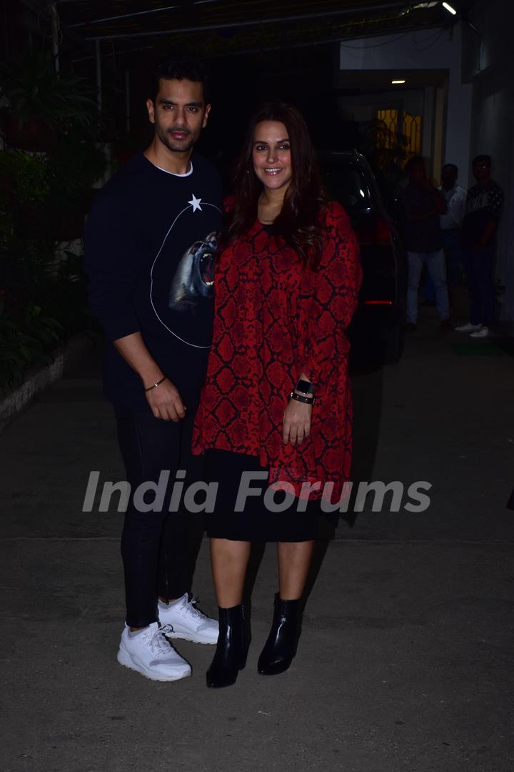 Angad Bedi with wife Neha Dhupia snapped during the screening of 'URI'