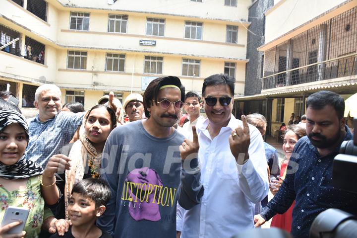 Ranveer Singh poses for a picture with his father