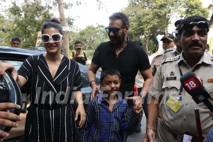 Ajay Devgan with wife Kajol and son at polling booth!