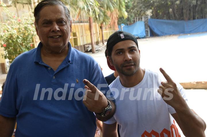 Varun Dhawan with father David Dhawan at polling centre! 