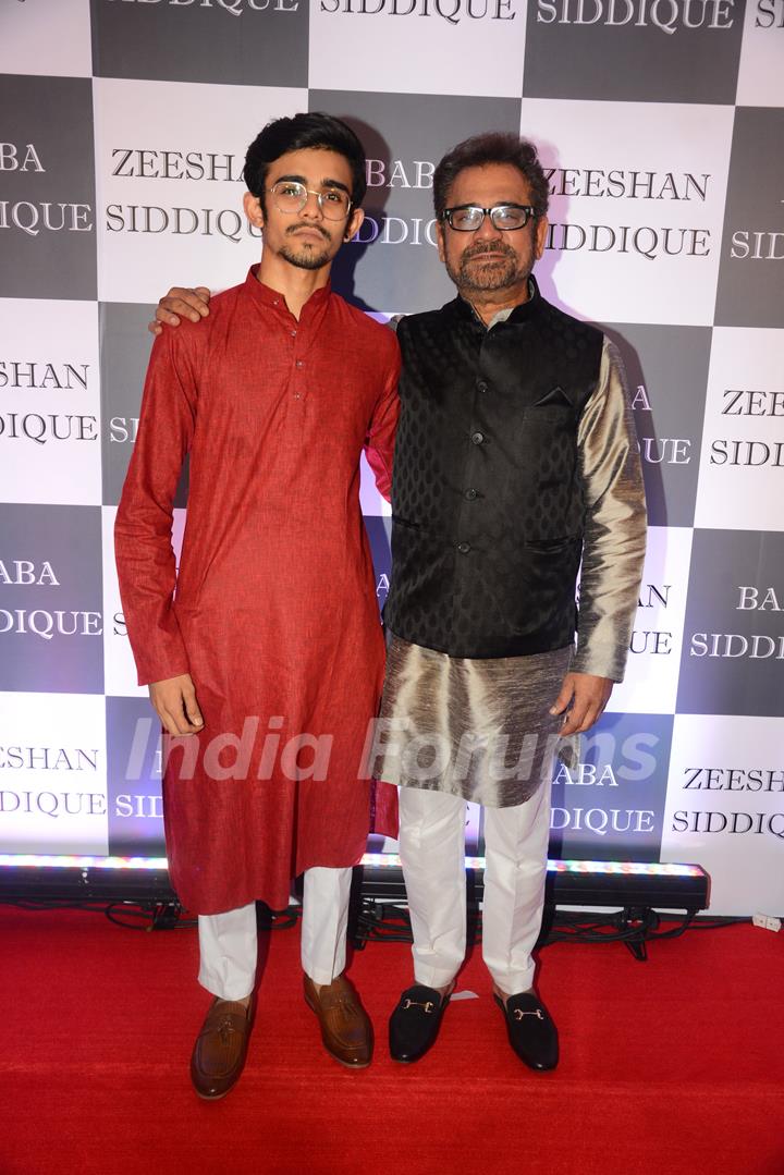 Aneez Basmee papped with his son at Baba Siddique's Iftar Party