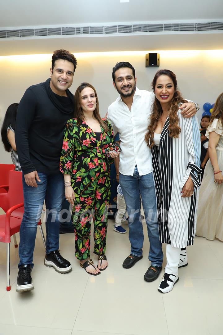 Krushna Abhishek and Kashmera Shah with the guests at their sons' birthday bash