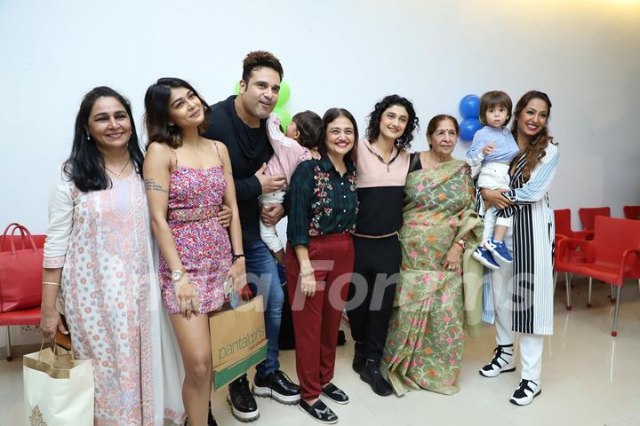 Krushna Abhishek and Kashmera Shah with the guests at their sons' birthday bash