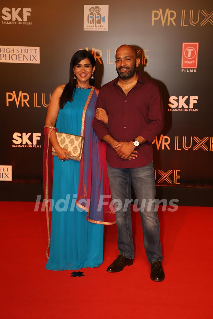 Sonali Kulkarni and her husband Nachiket Pantvaidya attend the special screening of Bharat
