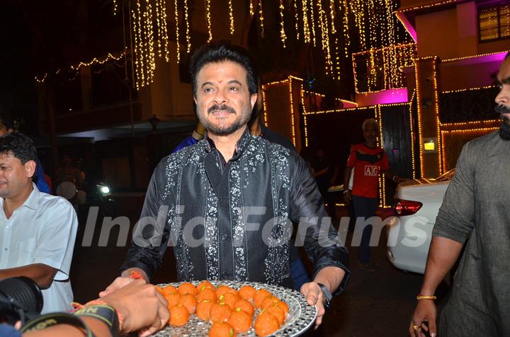Anil Kapoor offers sweets to paparazzi