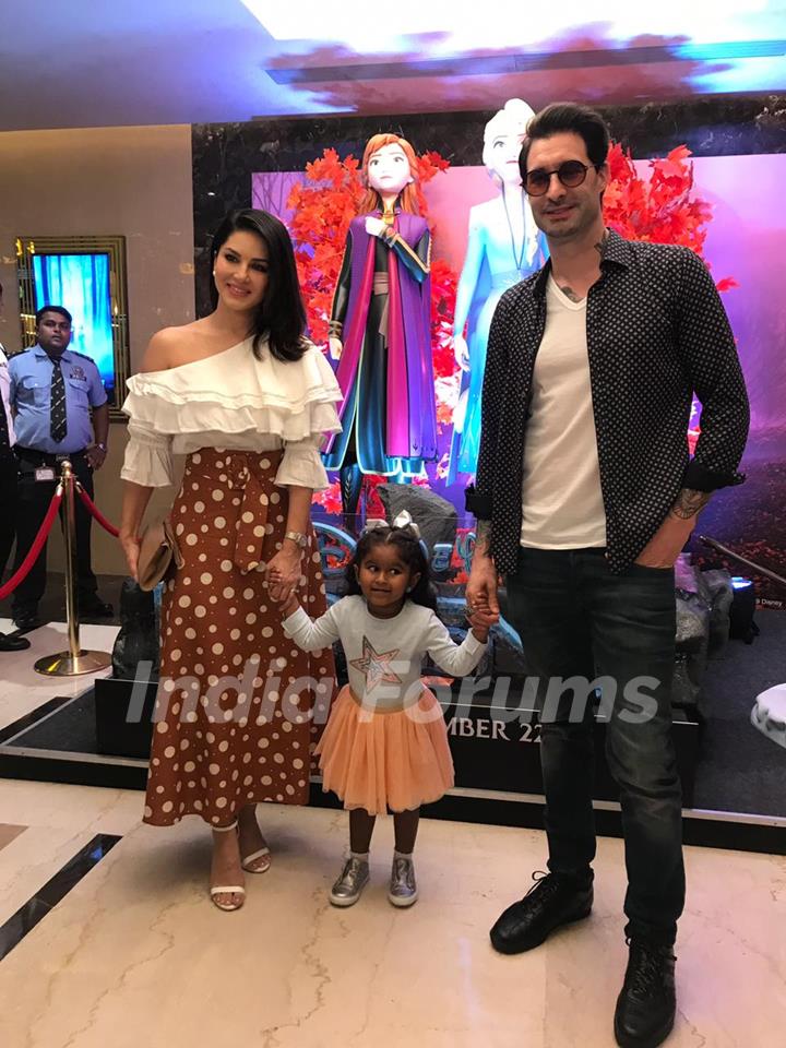 Sunny Leone and Daniel Weber attend Frozen 2's special screening with their daughter Nisha