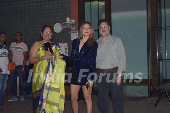 Amrita Arora with her parents