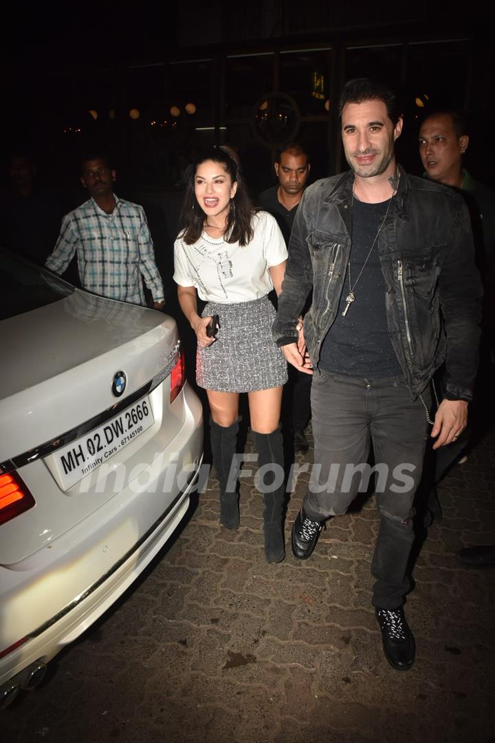 Sunny Leone and Daniel Webber snapped at an event last night