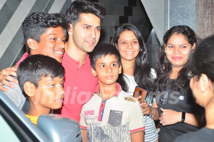 Varun Dhawan snapped otside his gym with his fans