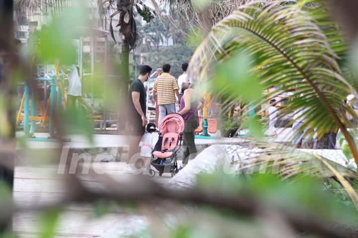 Angad Bedi and Neha Dhupia snapped walking with kids at Bandstand!