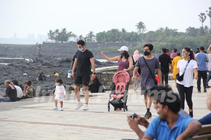 Angad Bedi and Neha Dhupia snapped walking with kids at Bandstand!