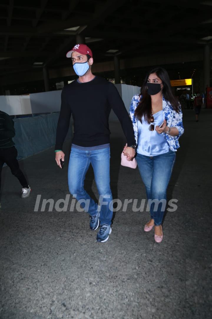 Amit kaur snapped with wife at airport