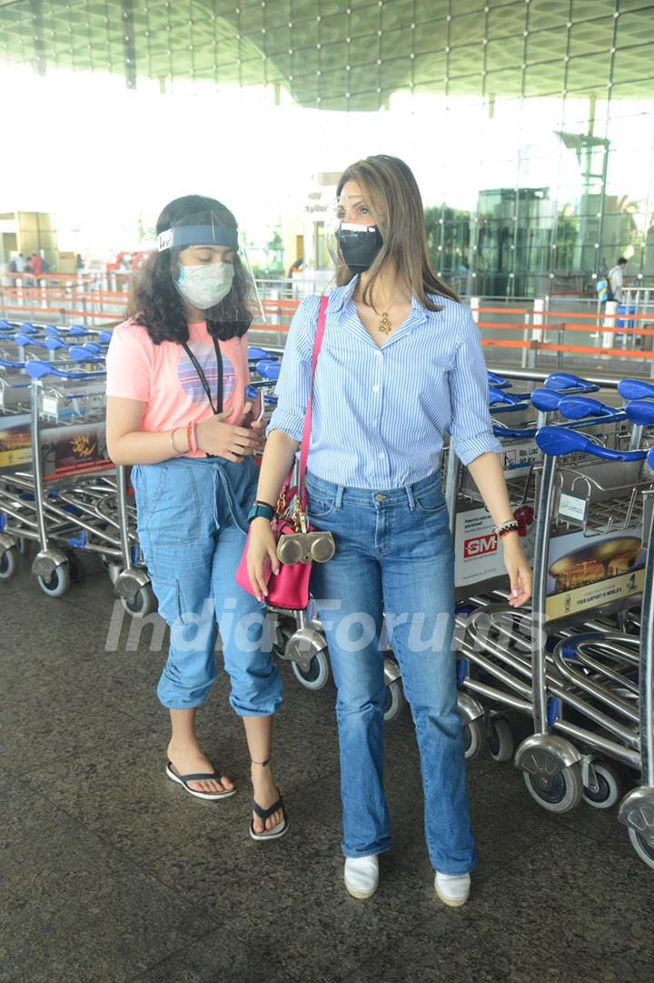 Riddhima Kapoor Sahani snapped departing with her daughter from Mumbai airport