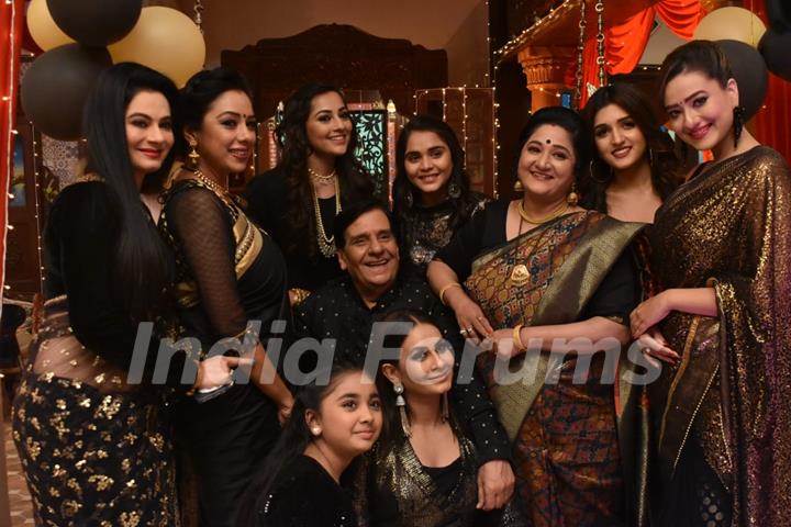 Full family on black and golden theme on Vanraj Birthday