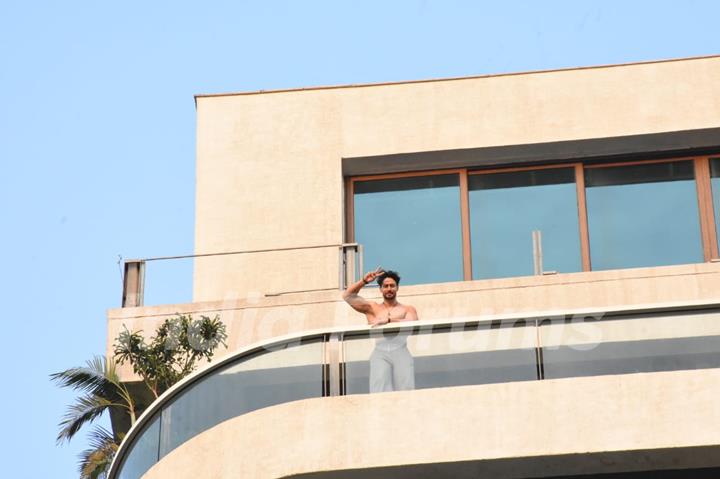 Tiger Shroff snapped flexing muscles in his balcony