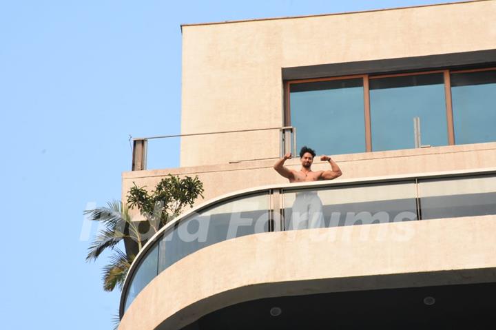 Tiger Shroff snapped flexing muscles in his balcony