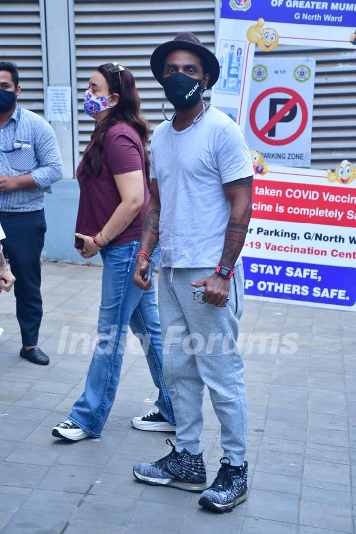 Remo D'Souza with wife Lizelle D'Souza spotted at Dadar vaccination centre