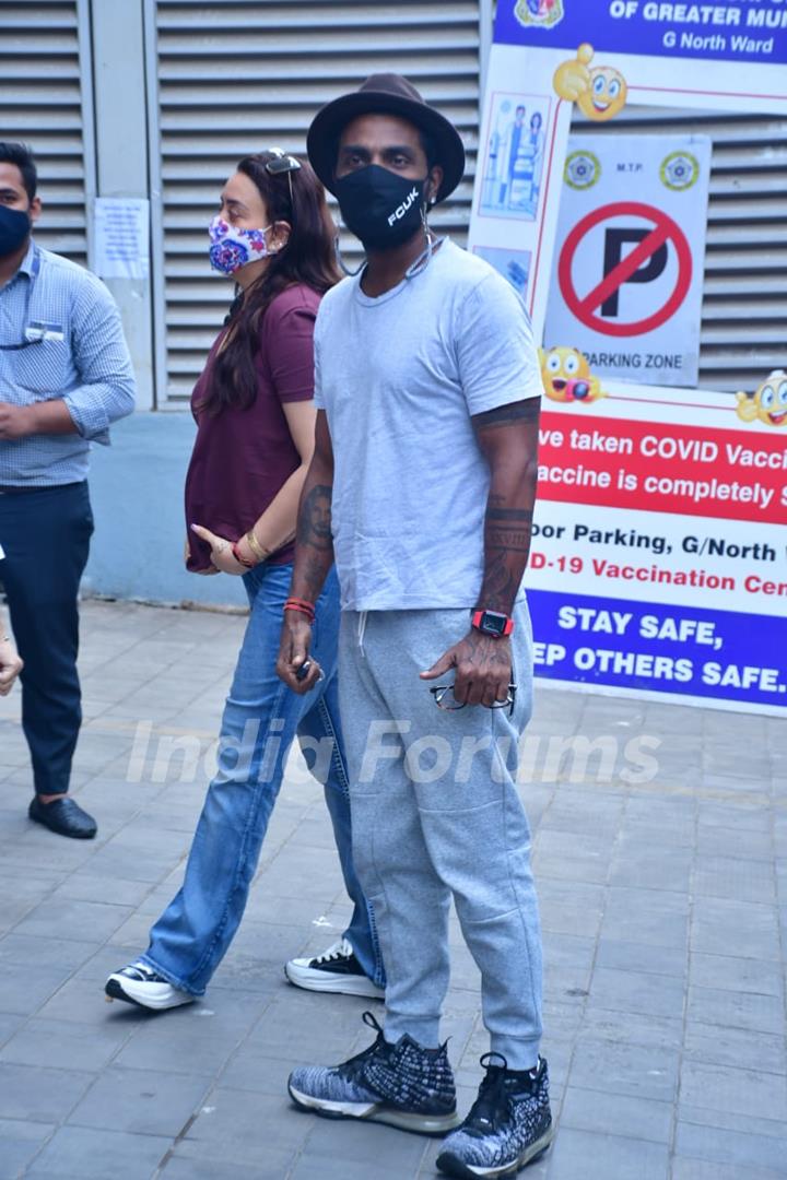 Remo D'Souza with wife Lizelle D'Souza spotted at Dadar vaccination centre