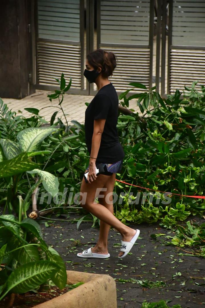 Malaika Arora snapped this morning taking her dog for a walk