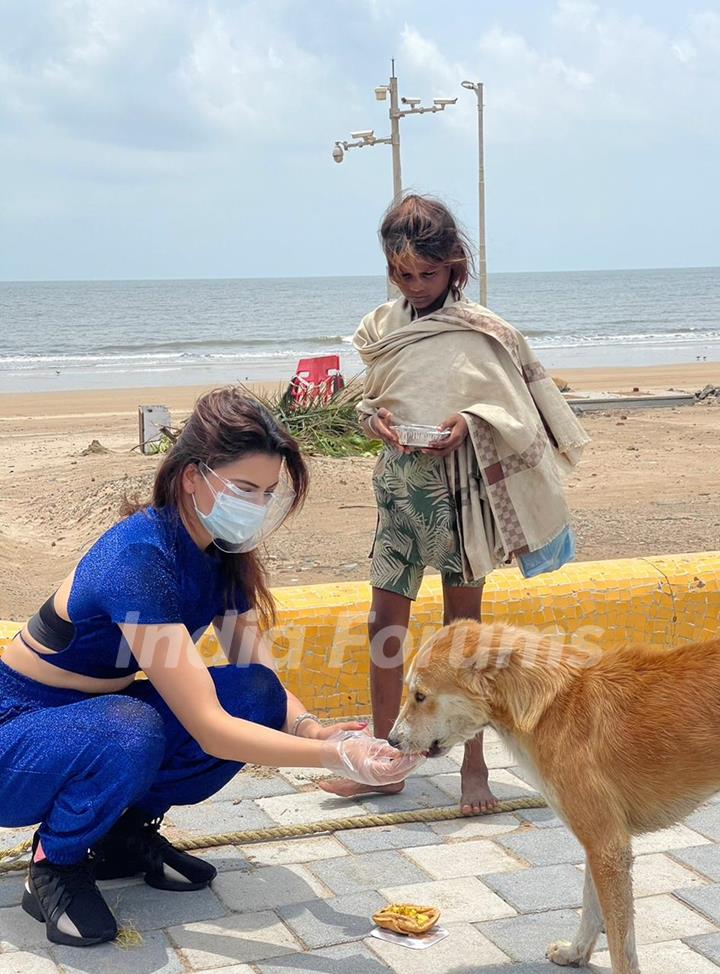 Urvashi Rautela distributes food amongst the needy affected by the cyclone Tauktae