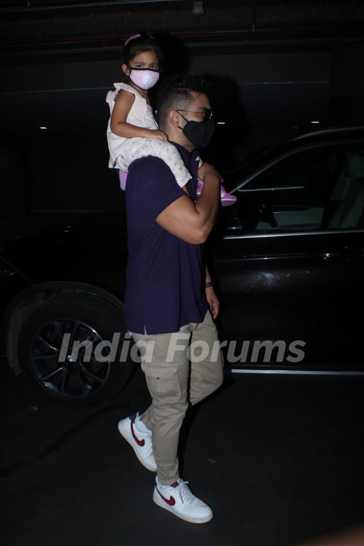 Neha Dhupia and Angad Bedi snapped arriving at Mumbai airport on Monday