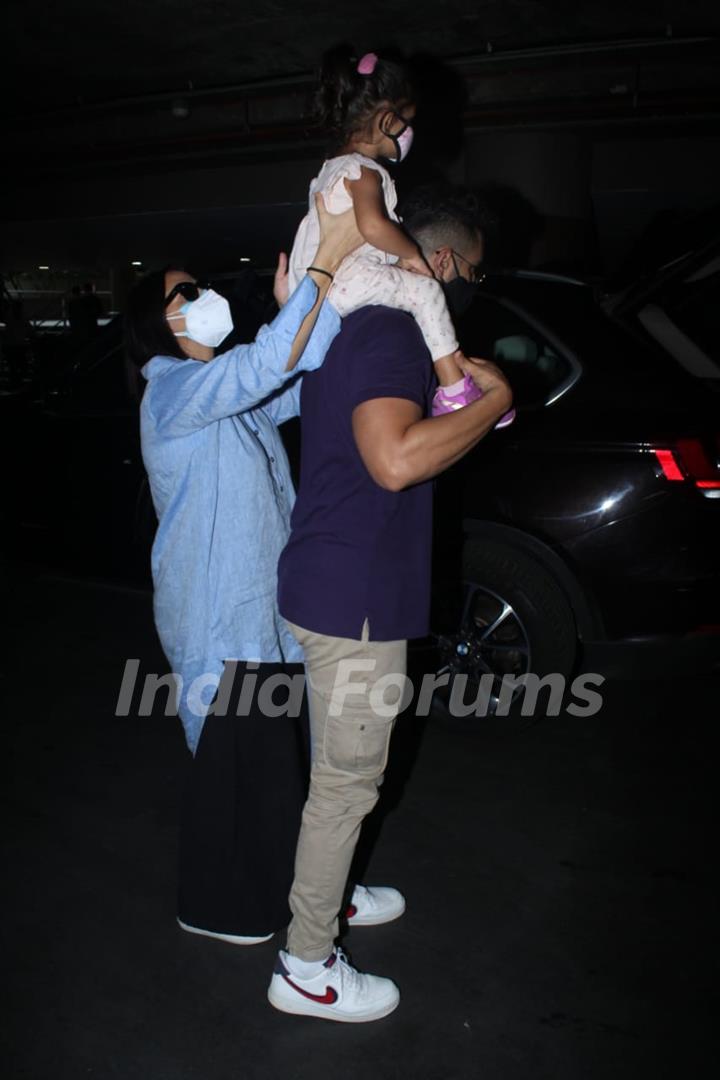 Neha Dhupia and Angad Bedi snapped arriving at Mumbai airport on Monday