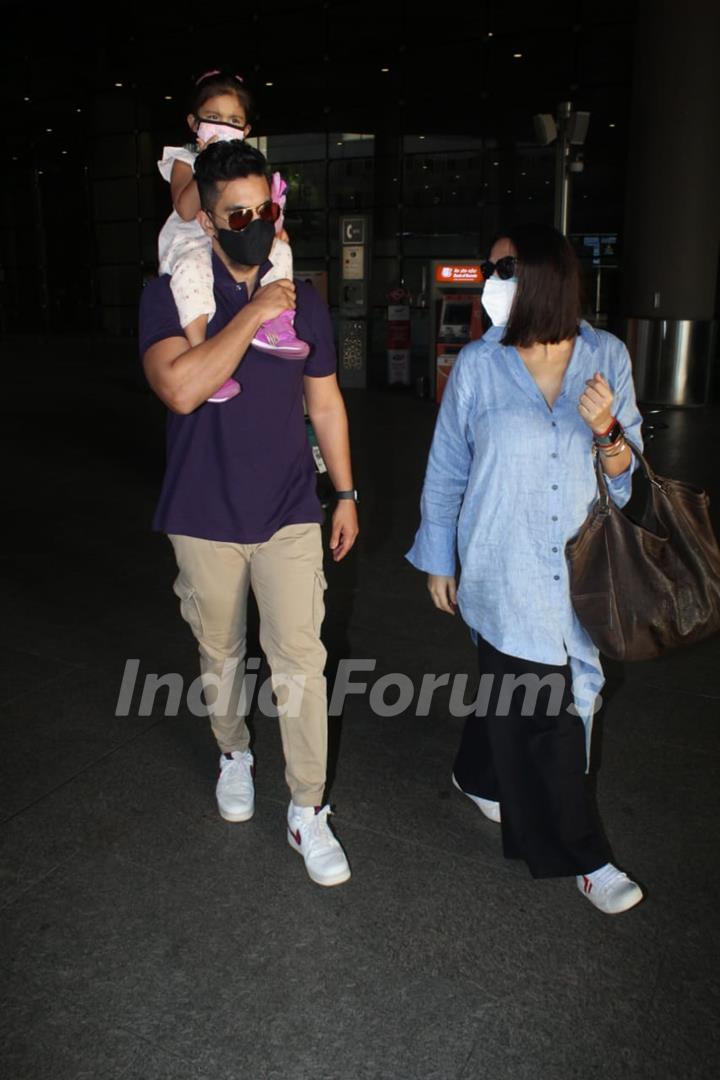 Neha Dhupia and Angad Bedi snapped arriving at Mumbai airport on Monday