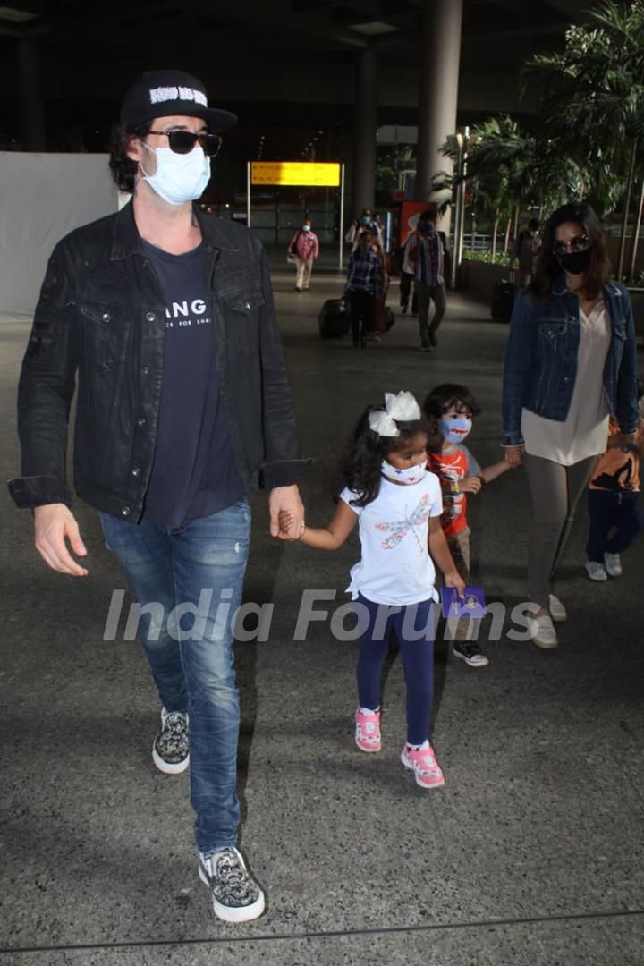 Sunny Leone and her family spotted arriving at Mumbai airport