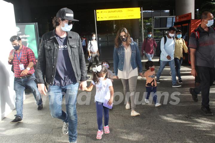 Sunny Leone and her family spotted arriving at Mumbai airport