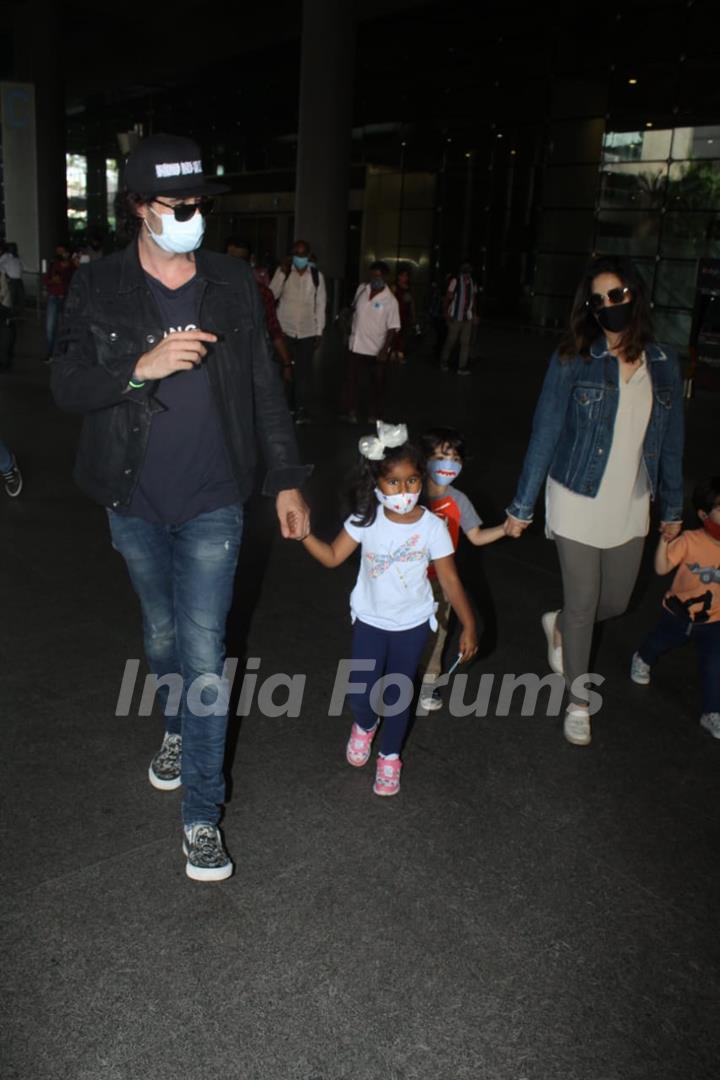 Sunny Leone and her family spotted arriving at Mumbai airport