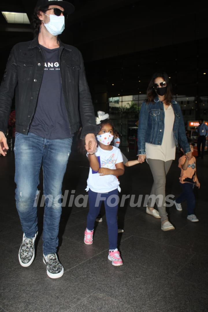 Sunny Leone and her family spotted arriving at Mumbai airport