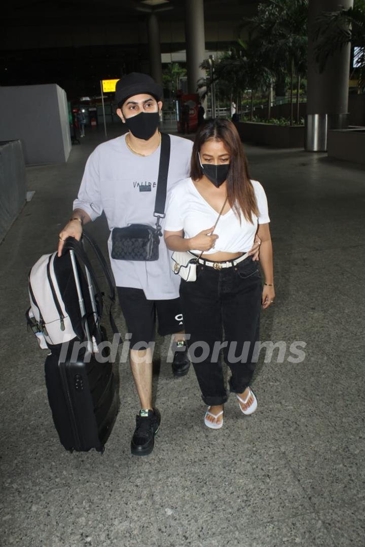 Neha Kakkar and Rohanpreet Singh snapped arriving at Mumbai airport