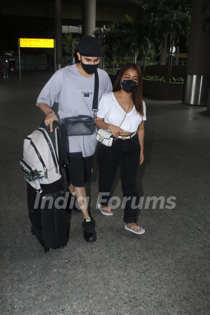 Neha Kakkar and Rohanpreet Singh snapped arriving at Mumbai airport