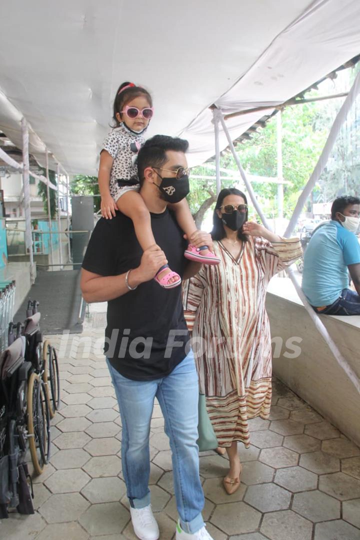 Neha Dhupia snapped with husband Angad Bedi and their daughter